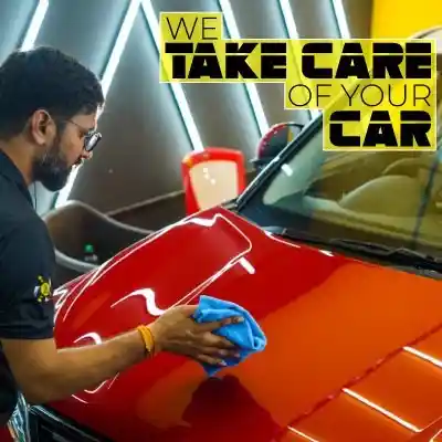 Professional technician inspecting a vehicle before service
